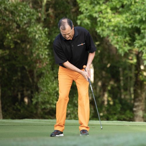 Orange Whip Putter Blade in use